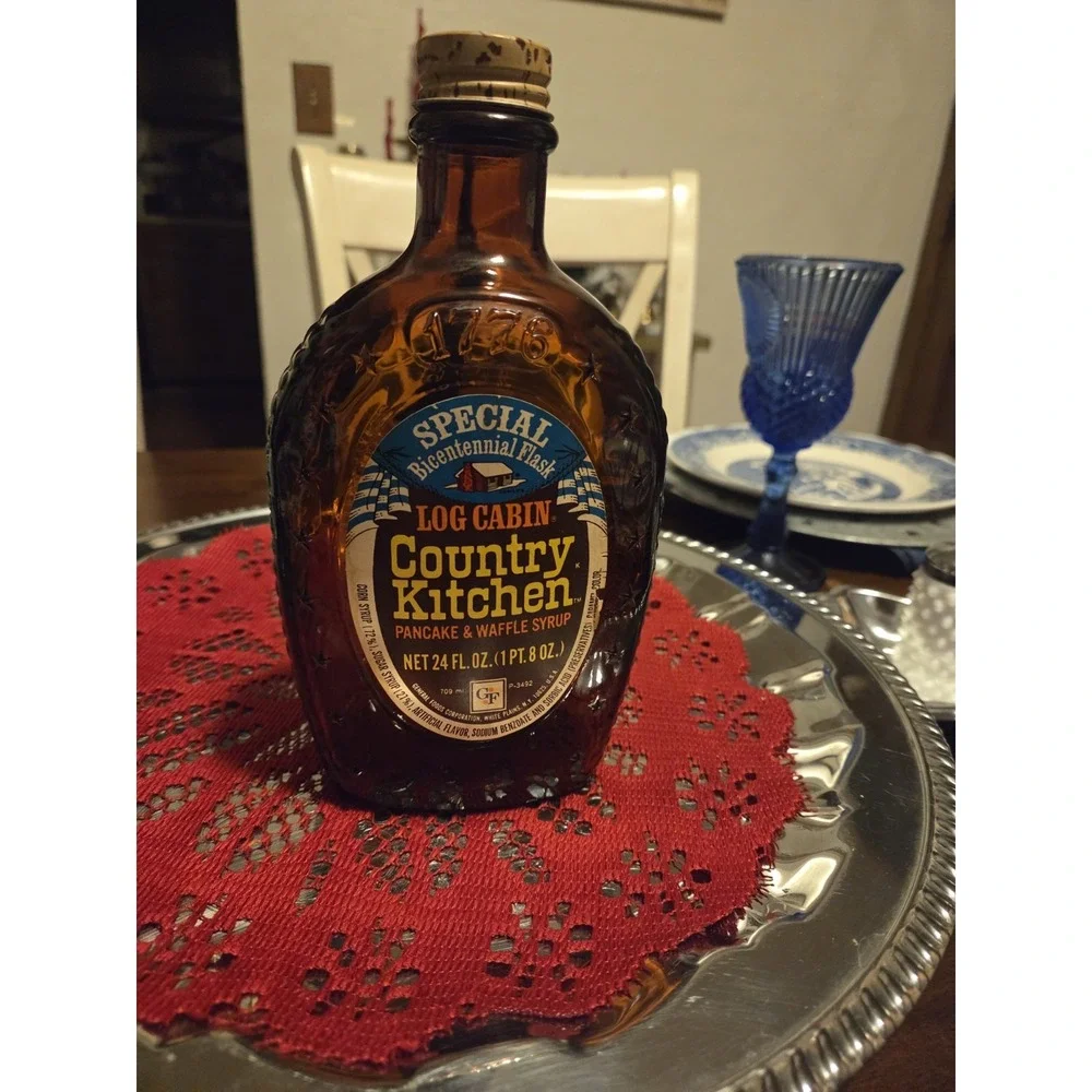 vintage 1976 amber glass Log Cabin Syrup commemorative bottle